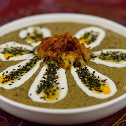 Khatoon Cuisine - Kashk -e Bademjoon 
Roasted eggplant purée blended with garlic, caramelized onions, fresh mint, creamy drained yogurt, and crushed walnuts