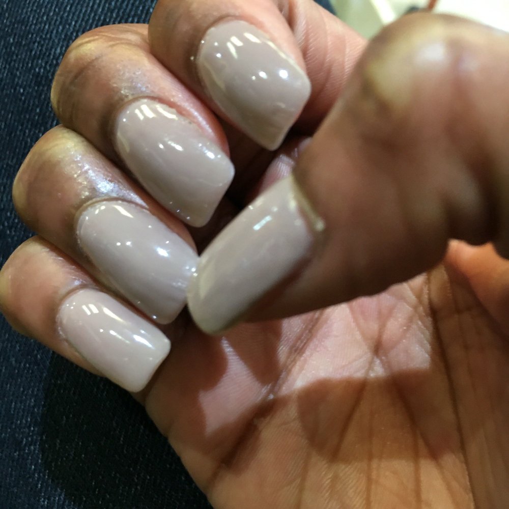 Very thin layer of gel polish application . Very thin layer of gel polish application .