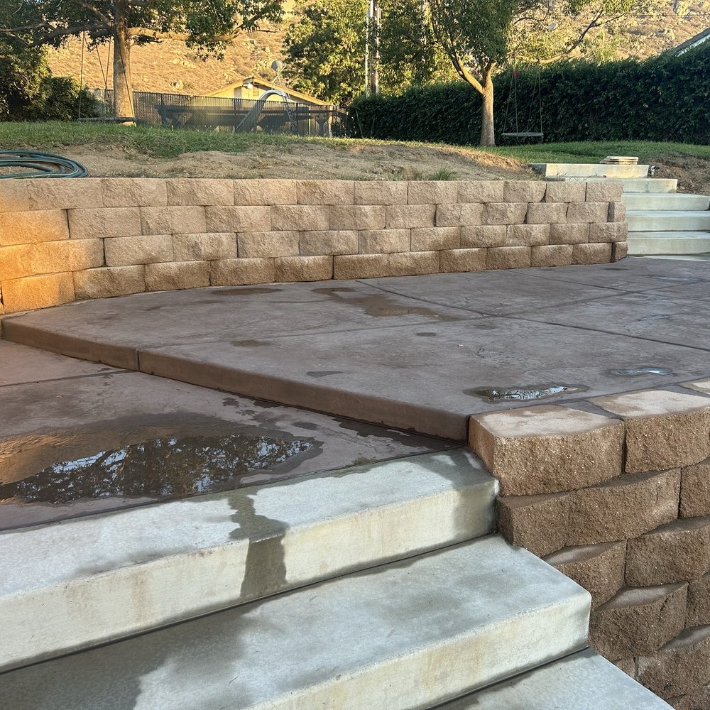 This is a small portion of a raised upper area in our backyard after being washed off with a power washer hence the leftover water. This is a small portion of a raised upper area in our backyard after being washed off with a power washer hence the leftover water.