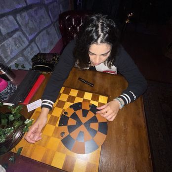 Elixir Tea Bar - Playing new magnetic wizard games - Bubble Tea Near Me - Costa Mesa, California