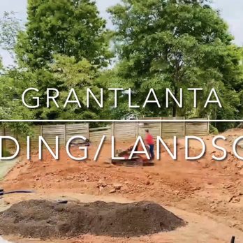Grantlanta Lawn - Julio grading and laying the soil. - Landscape Architects or Designers Near Me