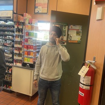7-Eleven - a man standing in a store talking on a cell phone - Convenience Stores Near Me - Santa Rosa, California 7-Eleven - a man standing in a store talking on a cell phone - Convenience Stores Near Me - Santa Rosa, California