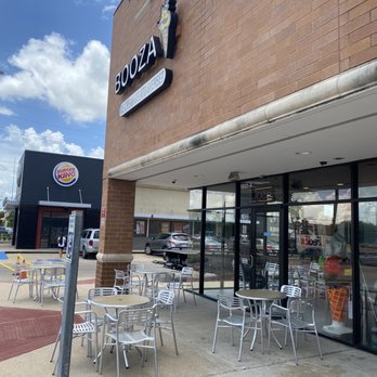 Booza - the outside of a restaurant with tables and chairs - Ice Cream & Frozen Yogurt Near Me - Houston, Texas