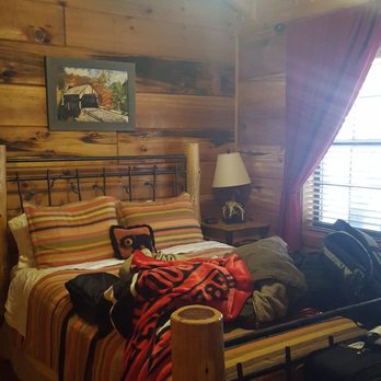 Sliding Rock Cabins - Please excuse the luggage on the bed - Vacation Rentals Near Me Sliding Rock Cabins - Please excuse the luggage on the bed - Vacation Rentals Near Me