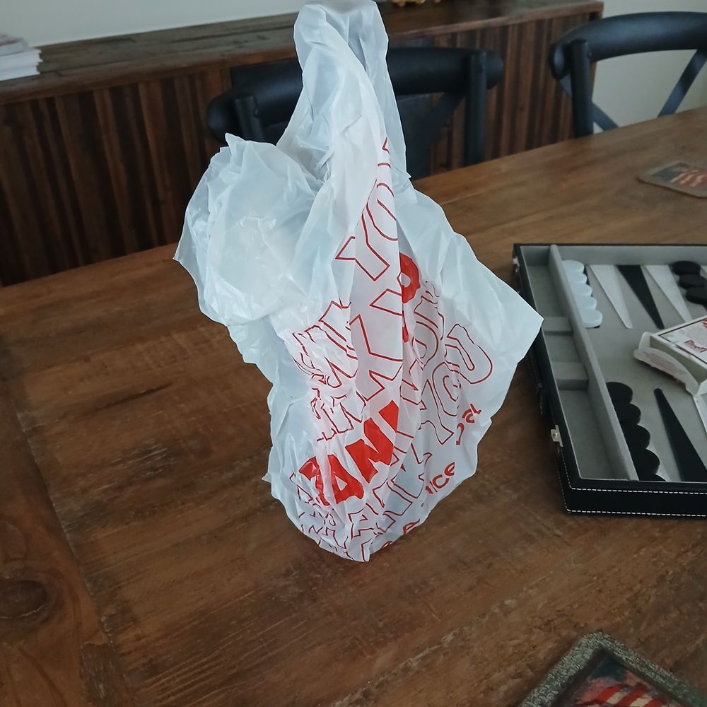 Langman Winery and Restaurant - $97.00 bottle of wine handed to me wrapped in a plastic bag.  Disappointing. - Cuban Near Me - Centerton, Arkansas