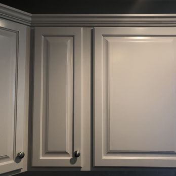 American Painting - After Kitchen Cabinets: White spray brushing and rolling (before: maple) - Painters Near Me