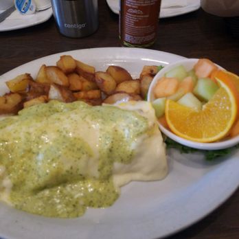 Rosine's Restaurant - Special of the day, omlette with pesto hollandaise sauce, roasted potatoes and fresh fruit. Delish and filling! - American Near Me - Monterey, California Rosine's Restaurant - Special of the day, omlette with pesto hollandaise sauce, roasted potatoes and fresh fruit. Delish and filling! - American Near Me - Monterey, California