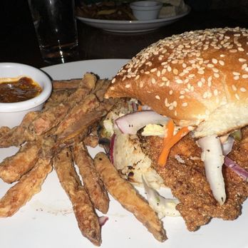 Fat Cats - Fried chicken sandwhich and sweet potato fries - New American Near Me - Cleveland, Ohio Fat Cats - Fried chicken sandwhich and sweet potato fries - New American Near Me - Cleveland, Ohio