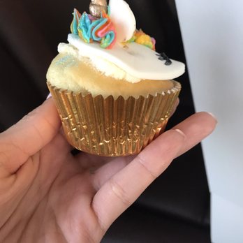 Bits N Bites Cake Shop - a hand holding a cupcake - Cupcakes Near Me - Copperas Cove, Texas