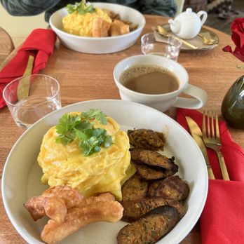 Tanzie's - SAI OUA (spicy sausages) Lava Egg with rice your choice of white or brown - Salad Near Me - Berkeley, California