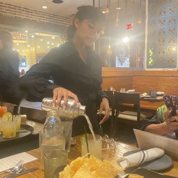 Uncle Julio's - Diana pouring my sisters drink - Mexican Near Me - Vernon Hills, Illinois