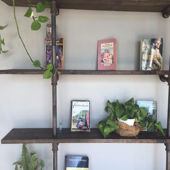 7 Leaves Cafe - A little bookshelf right behind! Love the interior design! - Coffee & Tea Near Me - Cypress, California