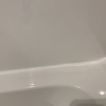Grout Rite Restorations - After pic. Bad grouting removed. Installed caulking. - Grout Services Near Me