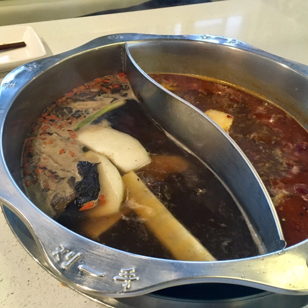 Half wild mushroom soup base, half traditional spicy soup base (mild but pretty spicy). Same price as choosing 1 soup base. Half wild mushroom soup base, half traditional spicy soup base (mild but pretty spicy). Same price as choosing 1 soup base.