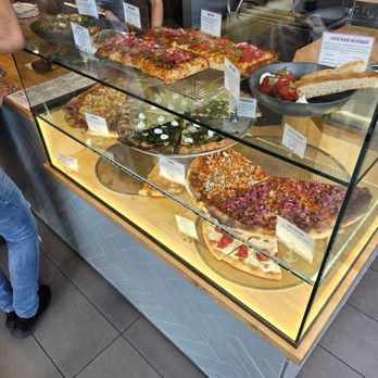 Elements Pizzeria - Pizza display at Elements pizzeria - Pizza Near Me - Queens, New York