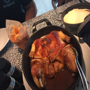 Champeaux - Chicken for 2 with a side of mashed potatoes .  I loved the lemony gravy on the chicken - Brasseries Near Me - Paris, 75