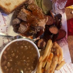 Sausage, pulled pork, fries, and baked beans
