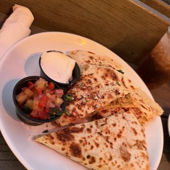 Tiki Docks Skyway - Pineapple chicken quesadilla - Tiki Bars Near Me - St. Petersburg, Florida Tiki Docks Skyway - Pineapple chicken quesadilla - Tiki Bars Near Me - St. Petersburg, Florida