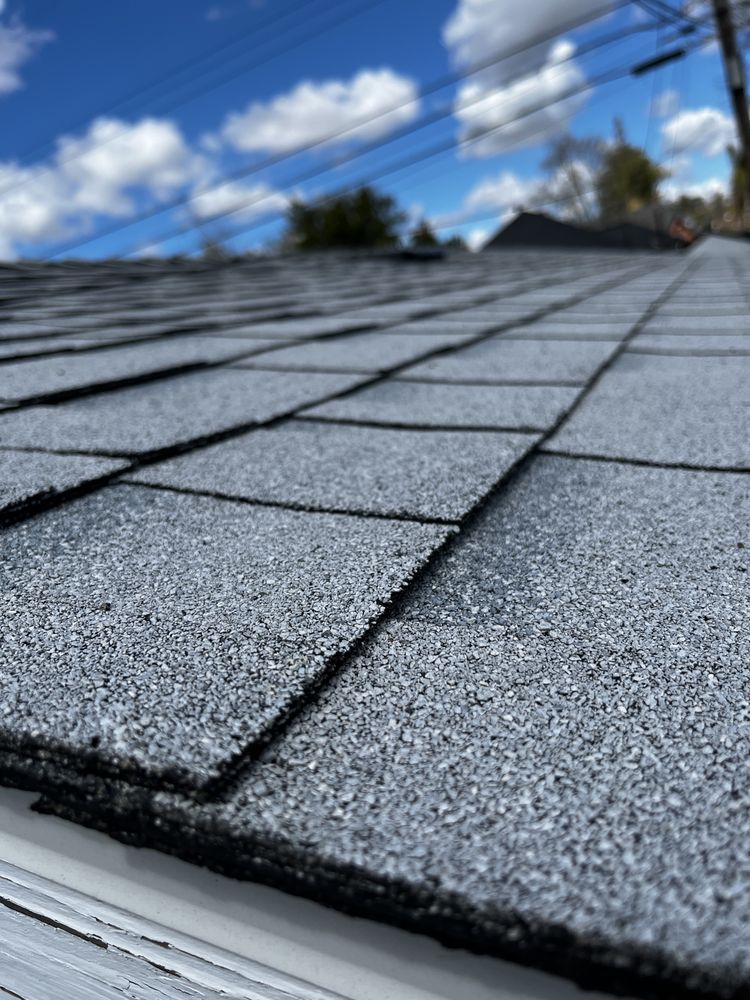 Slide of M&M Roofing