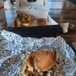 Cook Out - Barbeque sandwich with coleslaw and hot sauce. My 2 sides French fries and onion rings.