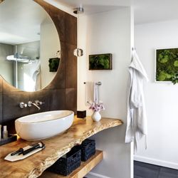 Log Art and Design - Custom design and build live edge oak bathroom countertop and matching shelves beliw