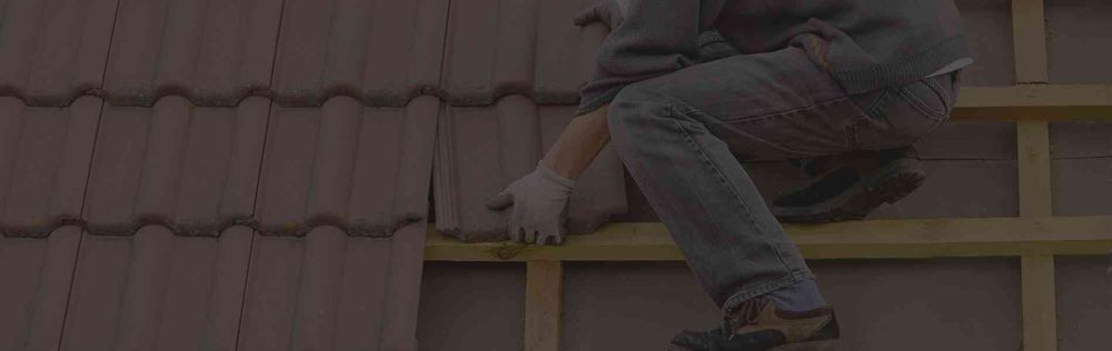 Slide of Two Men Roofing
