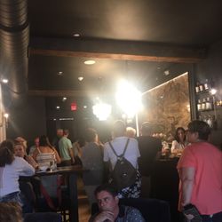 Looking at the bar from the front of the space.