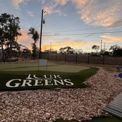 Memorial Mini-Golf And Museum - Practice green during sunset