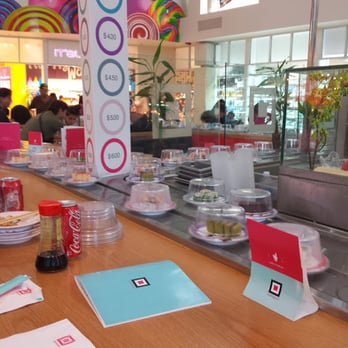 sushigami - Conveyor belt with pricing based on color of plate. The good ones tend to be light pink/pink of course... - Sushi Bars Near Me - Sunrise, Florida