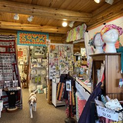 Cabin Quilting - Cabin Quilting entrance with official greeter "Lady".