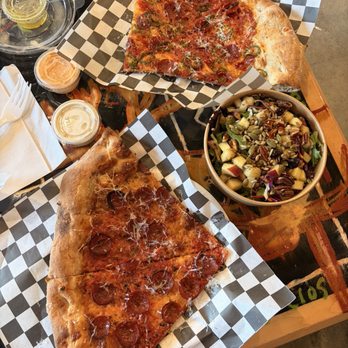 Wowee Zowee - 40th street pizza slice ($7) and hot stuff with nut salad combo ($14) . Yes that's considered 1 slice - Pizza Near Me - Tustin, California Wowee Zowee - 40th street pizza slice ($7) and hot stuff with nut salad combo ($14) . Yes that's considered 1 slice - Pizza Near Me - Tustin, California