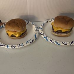 We get cheese burgers to go. They separate the buns from the meat/cheese so they are not soggy at home!