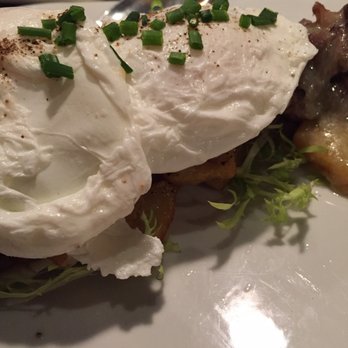 Elements Tapas - Two poached eggs on my main dish - Lounges Near Me - Medford, Oregon