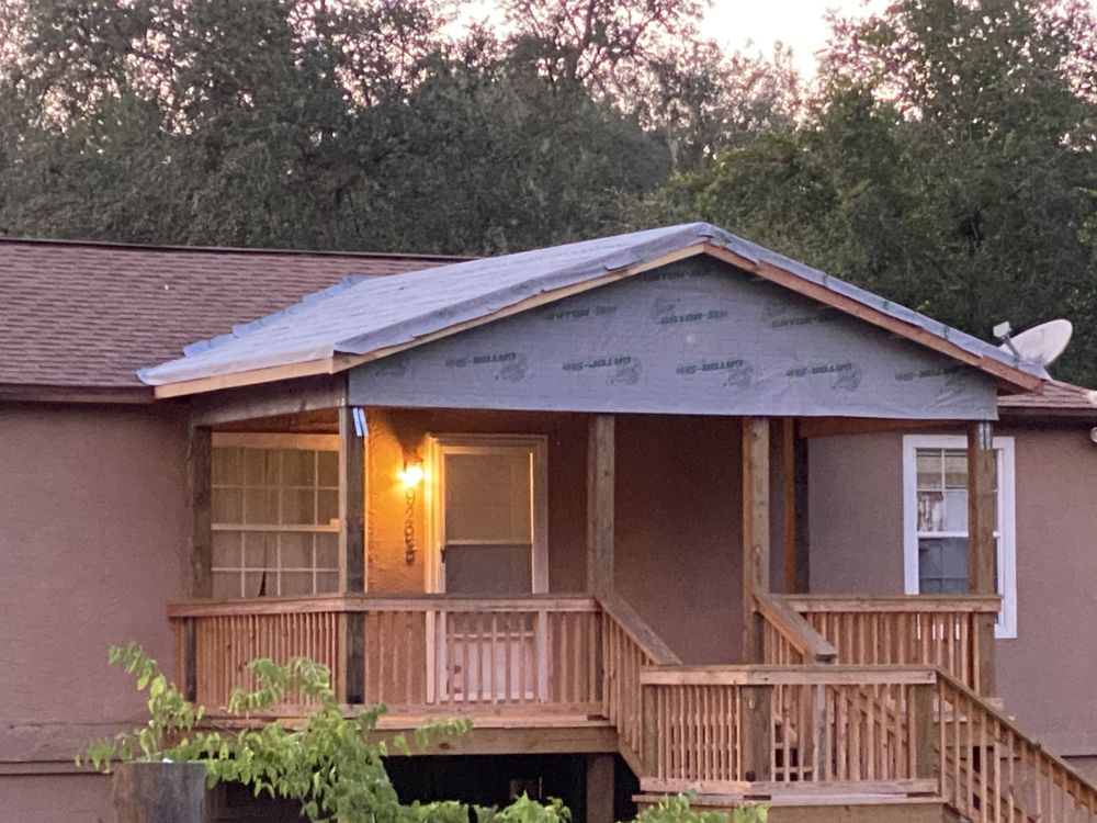 Slide of Tippy Top Roof Repair