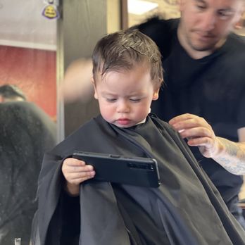 Normal Heights Barbershop - 23 month old getting his first barber cut - Barbers Near Me - San Diego, California Normal Heights Barbershop - 23 month old getting his first barber cut - Barbers Near Me - San Diego, California