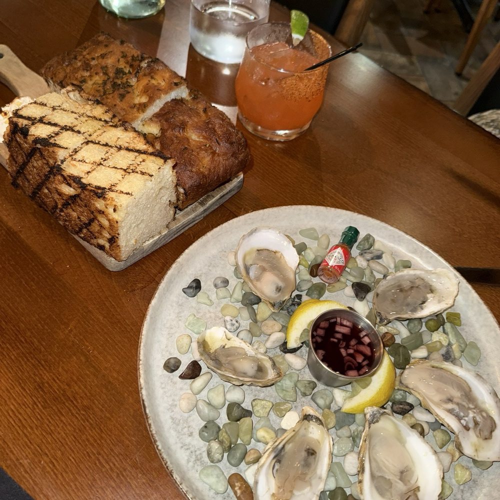 Oakhill Wine + Bistro - Oysters and focaccia - Wine Bars Near Me - Fresno, California Oakhill Wine + Bistro - Oysters and focaccia - Wine Bars Near Me - Fresno, California