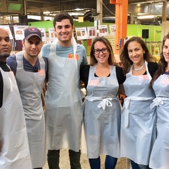 MultiView - Our Canada team volunteers at the local food bank. - Marketing Near Me - Irving, Texas