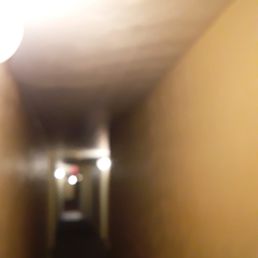 a long hallway with lights