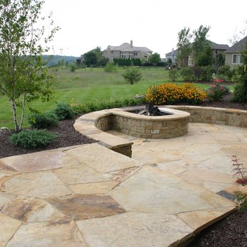 Mg Lawn Care Services - Patio and a beautiful fire pit - Lawn Services Near Me - Durham, North Carolina
