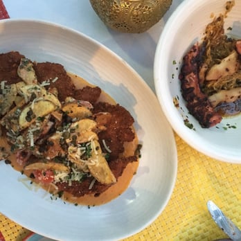 Juniper - Schnitzel on the left and charred octopus on the right - Bars Near Me - Wellesley, Massachusetts Juniper - Schnitzel on the left and charred octopus on the right - Bars Near Me - Wellesley, Massachusetts