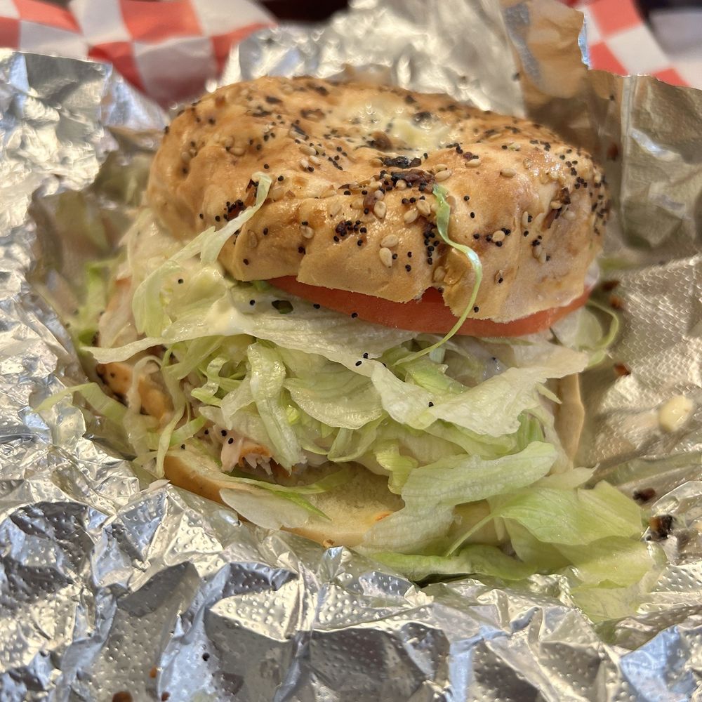 a sandwich wrapped in foil a sandwich wrapped in foil
