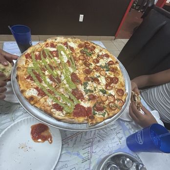 DoughBoyz Pizza - 1/2 Pepperoni Hot Honey 1/2 Grandma Margherita (Round). empty plate from Chicken Parm Stuffed Garlic Knot - Pizza Near Me - Oviedo, Florida