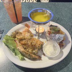 Big Game Casino and Tavern - Garlic shrimp appetizer with added drawn butter and baked potato