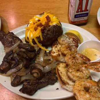 Texas Roadhouse - Steak topped with sautéed mushrooms and onion with shrimp skewer and loaded baked potato with lemon butter for shrimp - Steakhouses Near Me - Suffolk, Virginia Texas Roadhouse - Steak topped with sautéed mushrooms and onion with shrimp skewer and loaded baked potato with lemon butter for shrimp - Steakhouses Near Me - Suffolk, Virginia
