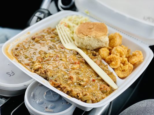 Photo of Poche's Market and Restaurant - Breaux Bridge, LA, US. Crawfish étouffée, dirty rice, shrimp & Cole slaw :)...