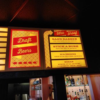 My-O-My - ows a sign above a bar - Cocktail Bars Near Me - Portland, Oregon