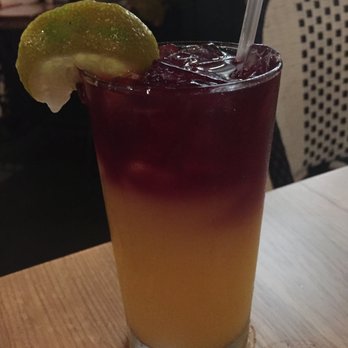 Postcards Restaurant - hibiscus cooler (pineapple juice with hibiscus iced tea & mint) - Seafood Near Me - Hanalei, Hawaii Postcards Restaurant - hibiscus cooler (pineapple juice with hibiscus iced tea & mint) - Seafood Near Me - Hanalei, Hawaii