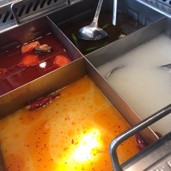 Haidilao Hotpot Flushing - Four different type of broth: tomato, green pepper, spicy pork bone and seafood tofu - Hot Pot Near Me - Flushing, New York Haidilao Hotpot Flushing - Four different type of broth: tomato, green pepper, spicy pork bone and seafood tofu - Hot Pot Near Me - Flushing, New York