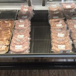 Bay's Meat Market - Fresh ground pork sausages and bacon.