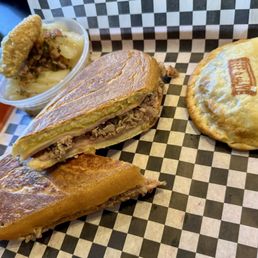 The 305 sandwich with boiled yucca and beef & olives empanada... delicious!! The 305 sandwich with boiled yucca and beef & olives empanada... delicious!!